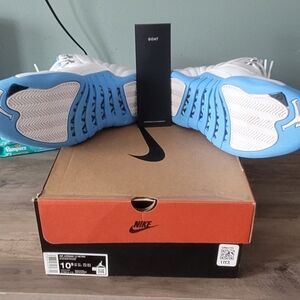 Nike White Sneakers with Light Blue Outsoles